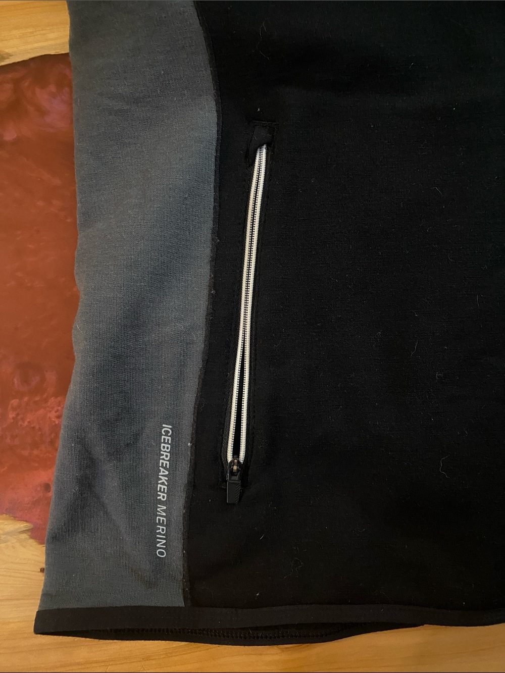 Icebreaker Black Merino Wool Full-Zip Vest with Chest Zip Pocket and side panels - Picture 5 of 9